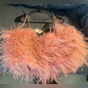 Pink feather crop top.